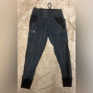 Barely worn black silk shell size small stretchy joggers by Blanc Noir